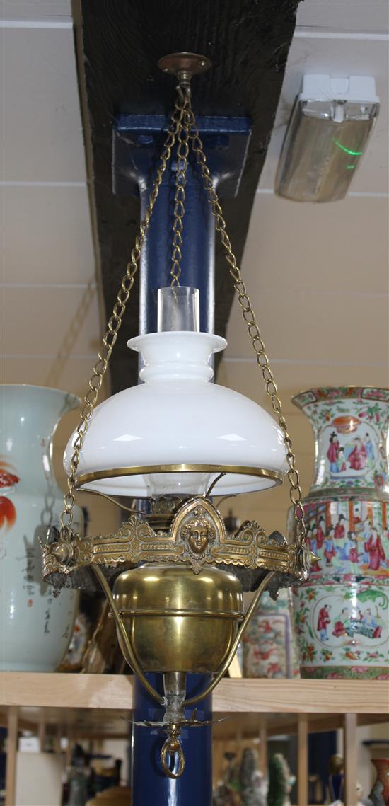 An Edwardian brass hanging oil lamp with opaque shade, overall drop 80cm